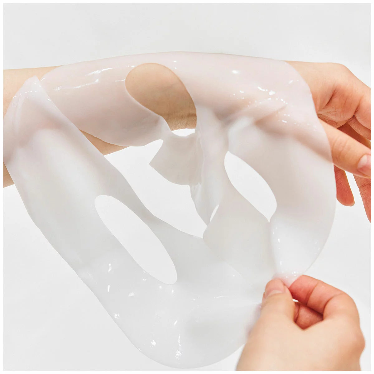 Close-up of Biodance bio collagen hydrogel sheet mask texture stretched by hand